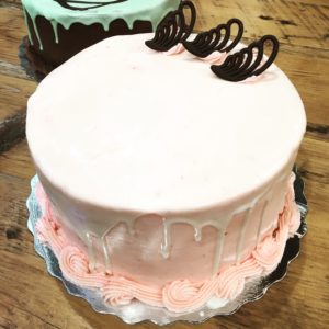 White Chocolate Raspberry Torte (vanilla cake, homemade raspberry preserve filling, raspberry flavoured buttercream, white chocolate ganache)