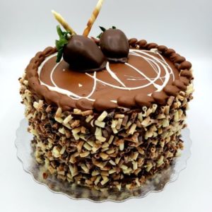 Death by Chocolate Cake (chocolate cake, decadent fudge icing and filling, garnished with chocolate decorations and chocolate dipped strawberries)