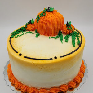 Thanksgiving Harvest Cake 9" (serves 6-8) Chocolate cake, oreo buttercream filling, vanilla icing.