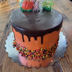 Autumn's Glory Cake 6" (serves 406) Vanilla cake, vanilla buttercream icing, caramel filling, hazelnut fudge truffle topping