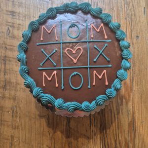 Mom's Tic Tac Toe Cake 9" serves 6-8 (chocolate cake, fudge icing & filling)