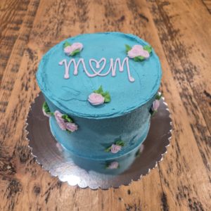 We Love You Mom Cake 6" serves 4-6 (vanilla cake, vanilla buttercream icing, venetian cream filling)