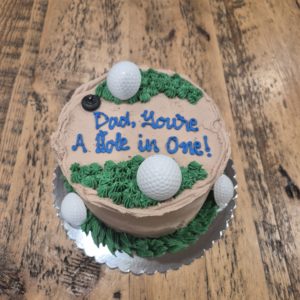 Dad's Hole In One Cake (6" serves 4-6, chocolate cake, cookie dough icing, chocolate chip filling)